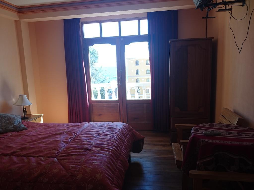Hostal Real Los Andes Del Lago โกปากาบานา ห้อง รูปภาพ