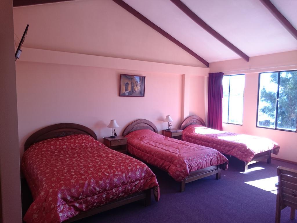 Hostal Real Los Andes Del Lago โกปากาบานา ภายนอก รูปภาพ