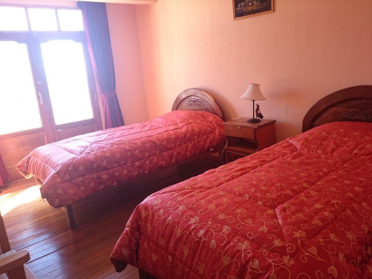 Hostal Real Los Andes Del Lago โกปากาบานา ภายนอก รูปภาพ